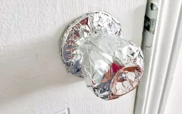 The Unlikely Solution Wrapping Foil Around Your Door Knob